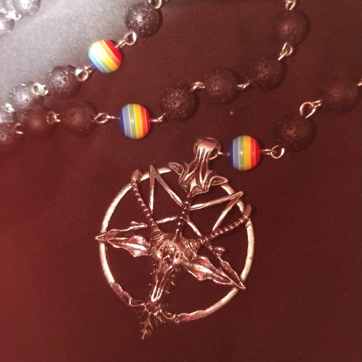 baphomet charm with pentagram, and prayer beads