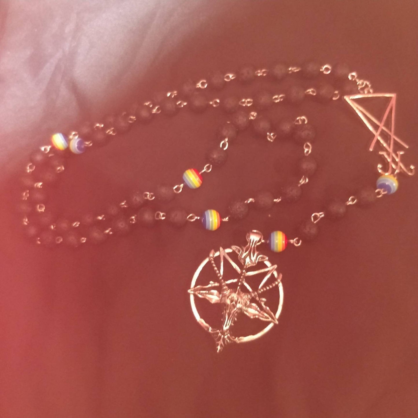 misty mystical view of lgbt satanic prayer beads