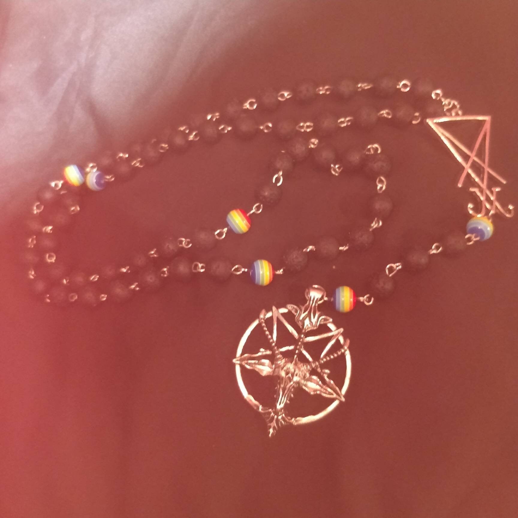misty mystical view of lgbt satanic prayer beads