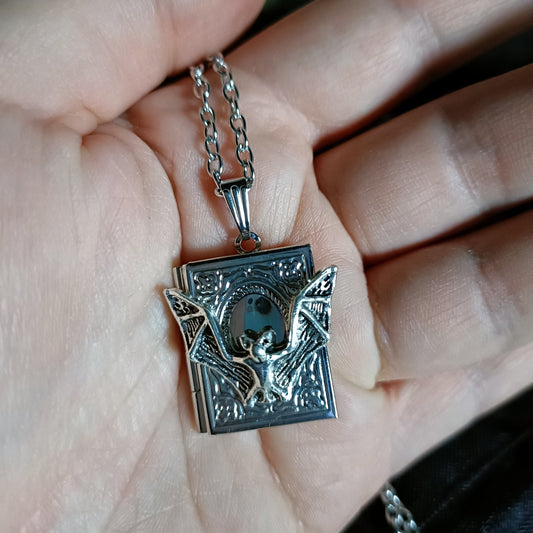 Bat Book Locket Necklace - locket opens and closes, arms wide flying bat at front