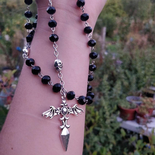 gothic rosary skulls and bats