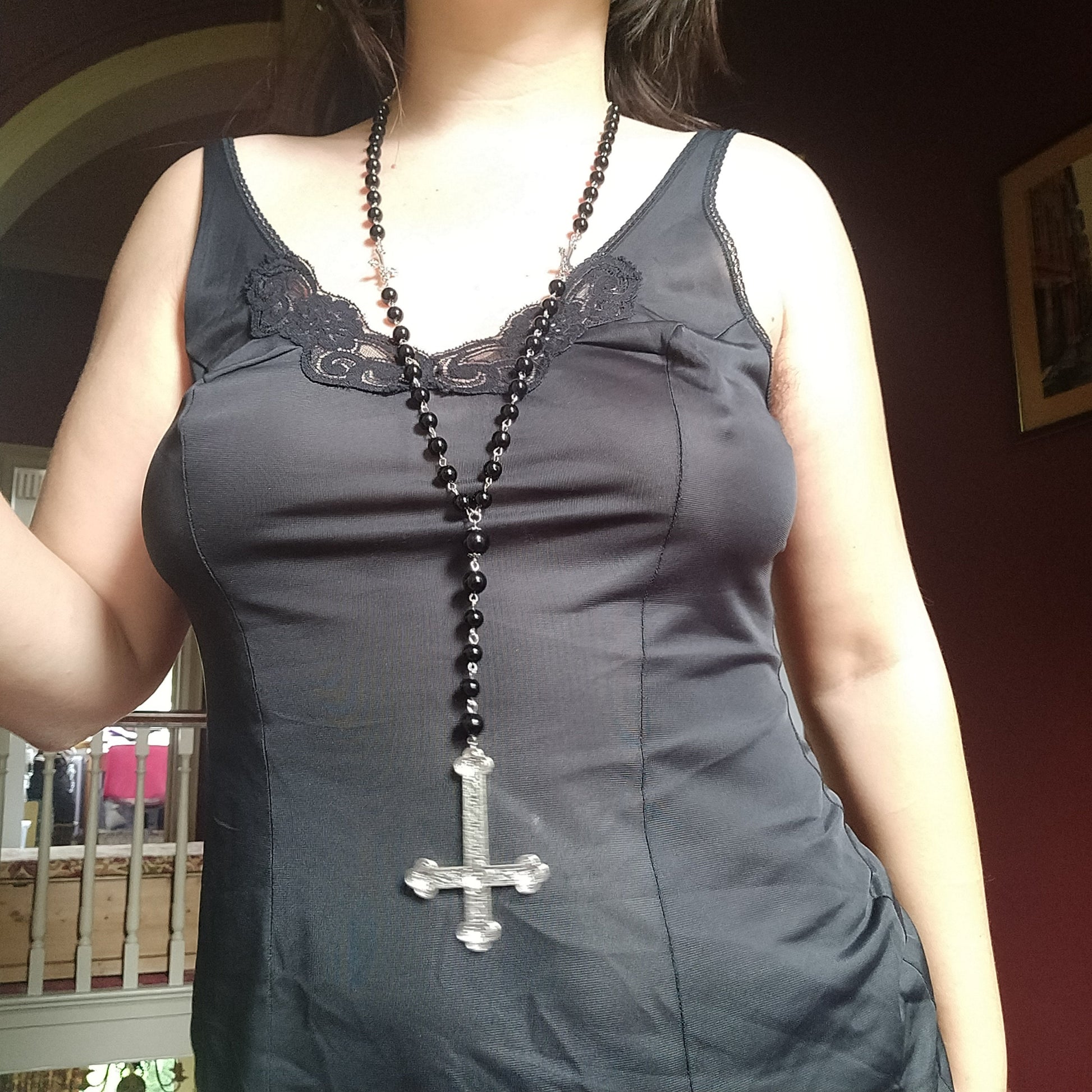 modelling this rosary. bottom of cross reaches the bellybutton of 5 foot 6 inch woman.
