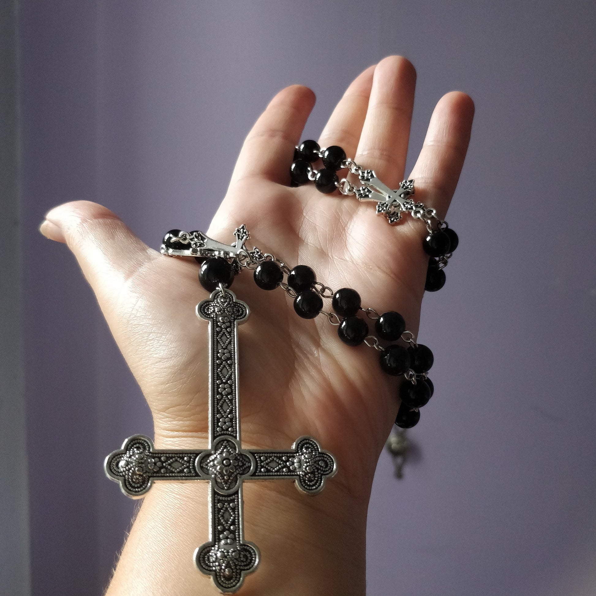 Inverted crucifix rosary- large cross charm and beads with small crucifixes joining the beads