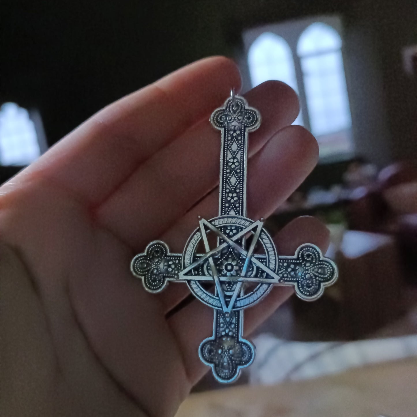 inverted crucifix and pentagram earrings