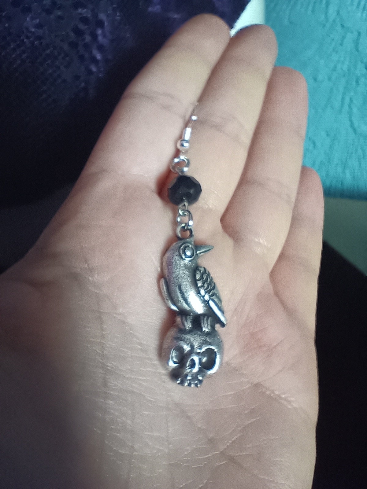 raven-on-skull-earrings