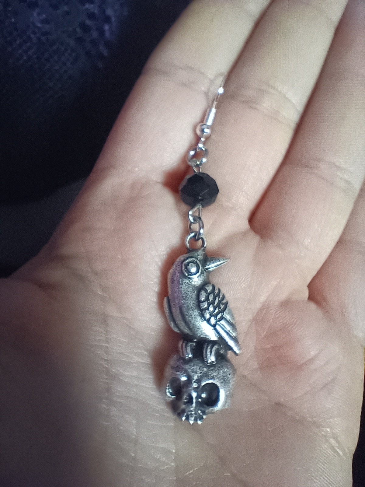 retro-metal-cast-crow-on-skull-earrings