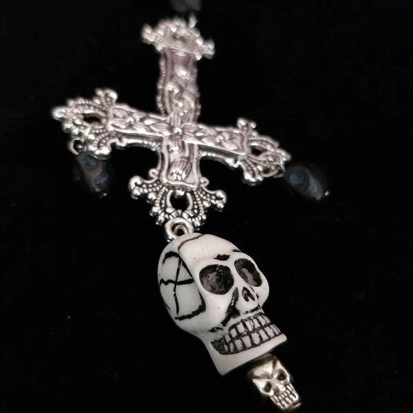 Crucifix and skull earrings